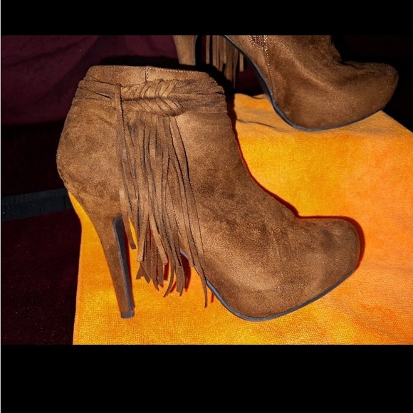Fringe Accents Stlietto Heel
Ankle Booties - Picture 2 of 5